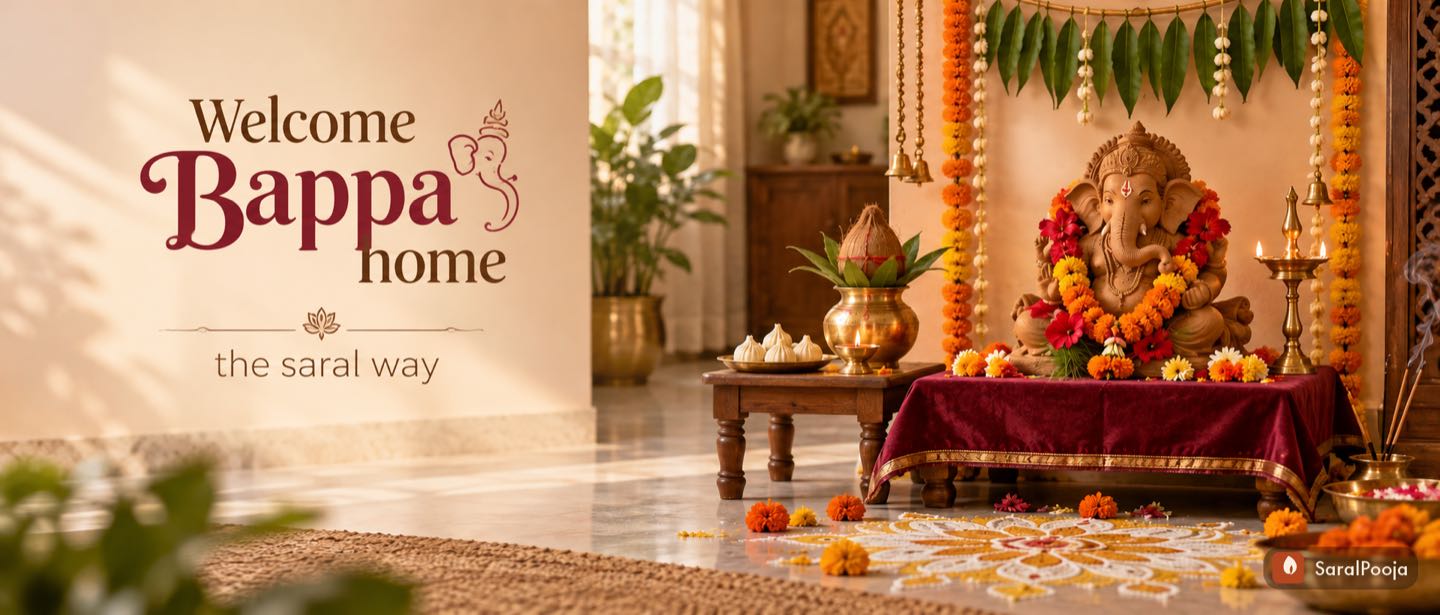Welcome Bappa home, the saral way — a Ganesh idol on a decorated chowki with kalash, modak, diya and rangoli